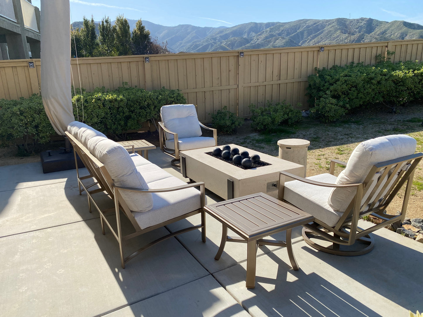 60" x 36" American Fyre Designs Iron Saddle Firepit Travertine 580-TR-11-M7