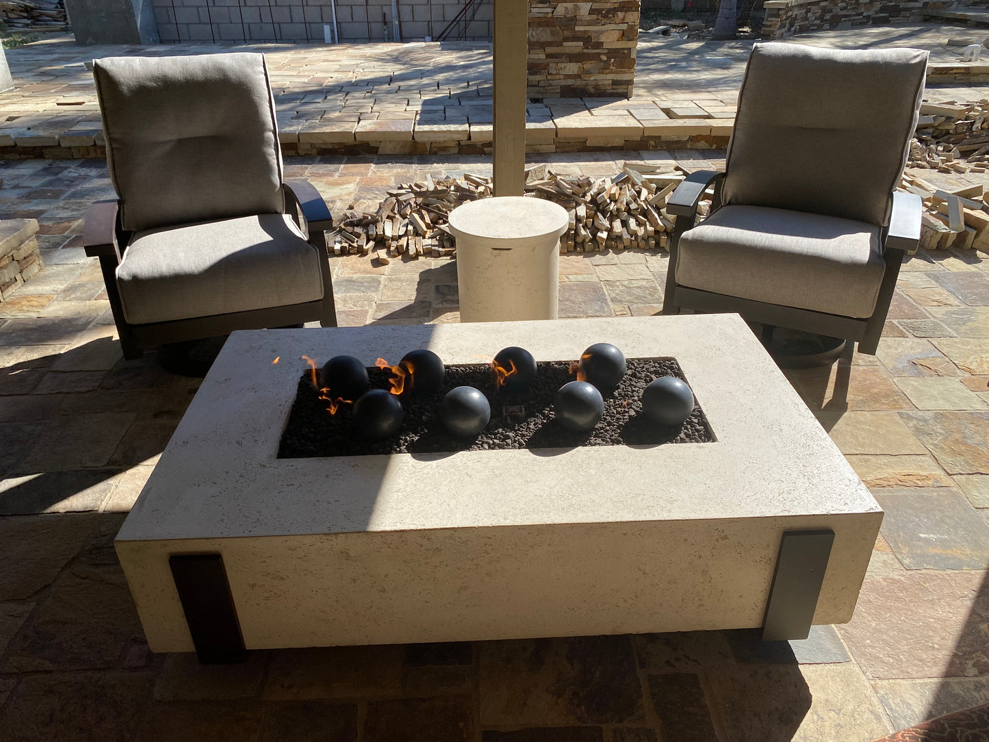 60" x 36" American Fyre Designs Iron Saddle Firepit Travertine 580-TR-11-M7