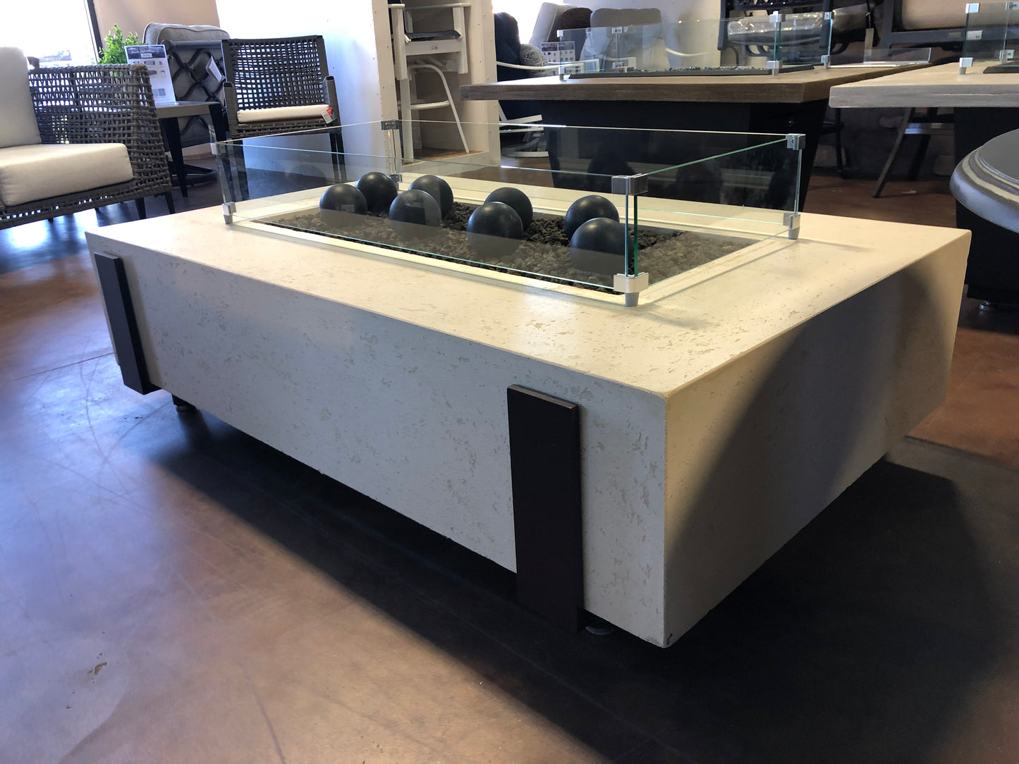 60" x 36" American Fyre Designs Iron Saddle Firepit Travertine 580-TR-11-M7