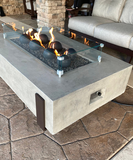 American Fyre Designs 60"W x 36"D x 17"H Iron Saddle Firepit Package w/ Lava, Spheres, Wind Guard & Cover - Light Bassalt (NG)