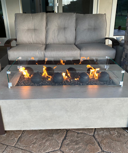 American Fyre Designs 60"W x 36"D x 17"H Iron Saddle Firepit Package w/ Lava, Spheres, Wind Guard & Cover - Light Bassalt (NG)